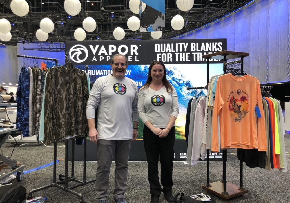 Image of Jim and Shelby at Vapor Apparel Booth